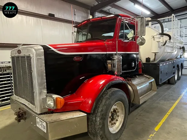 A shot of a vehicle being prepped for a wrap installation in a clean, climate-controlled facility.